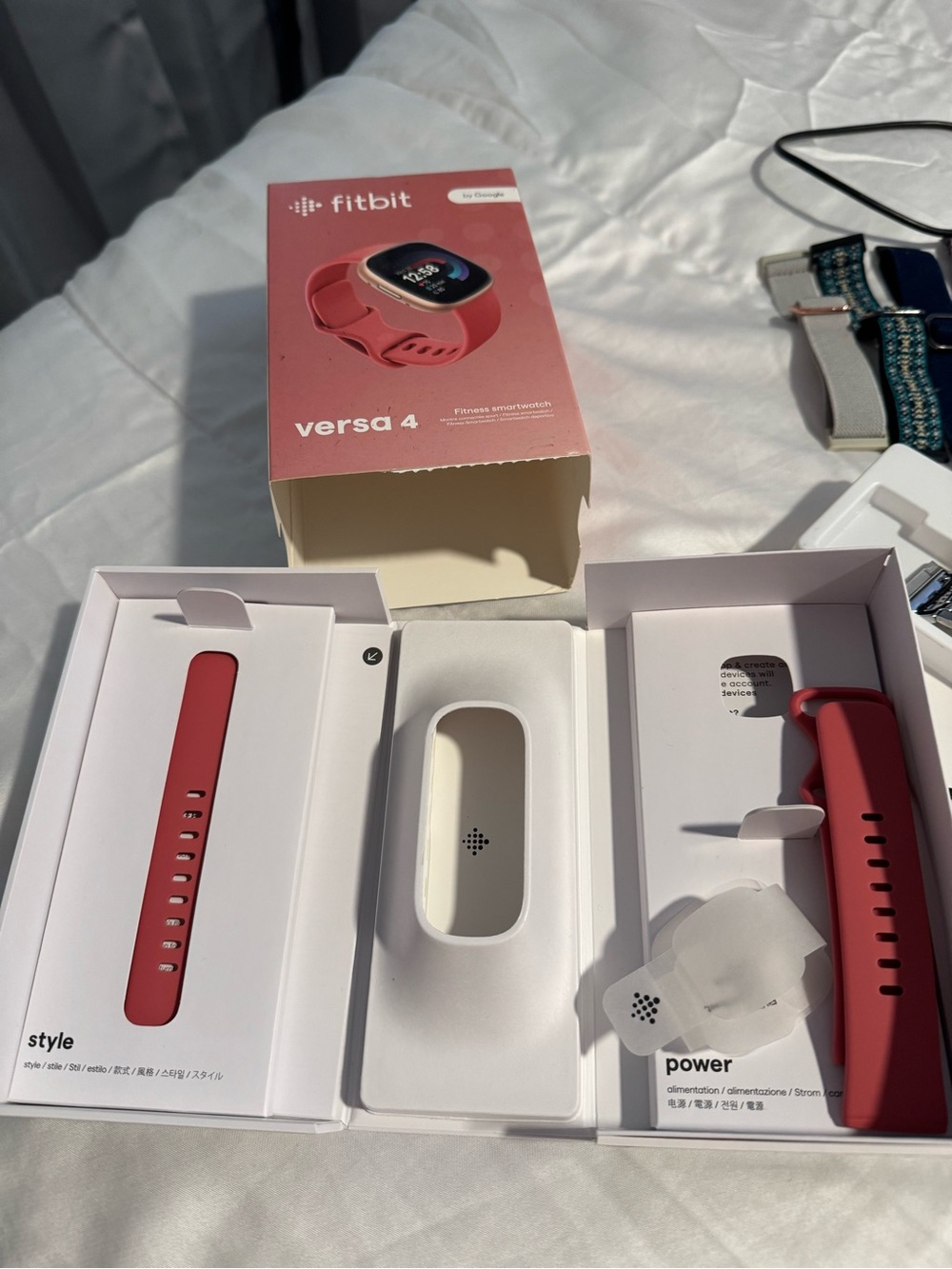 fitbit Versa 4 Rose GoldSmartwatch with Assorted Bands and Cases - Picture 3 of 5